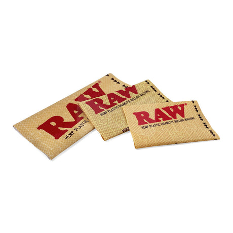 Top down flat lay view of RAW spare roller aprons in translucent white, showing different sizes side-by-side. Designed to replace worn-out belts, this specific 79mm rolling machine sleeve comes in a convenient 10-count box to ensure your dry herb rolls stay perfectly packed and consistent.