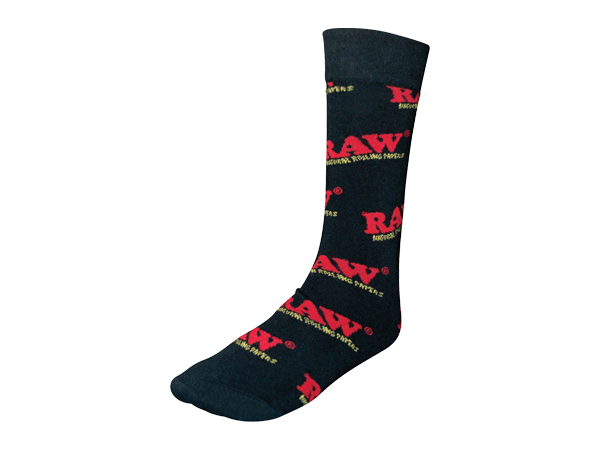 Front angled view of the RAW Black Crew Socks Hemp Blend Apparel laid flat. These premium mid-calf crew socks feature a comfortable, breathable hemp-cotton blend fabric with the signature red RAW logo boldly knitted near the top cuff.