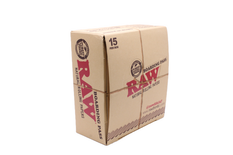 Angled overhead view of the RAW boarding pass portable tray display in brown and tan. These compact rolling trays feature raised, curved edges to neatly contain materials and prevent tabletop spills.