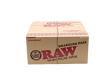 Front view of the RAW boarding pass portable tray display box in natural kraft brown and red. This 15-count retail display offers a travel-friendly metal rolling platform designed to catch loose herbs during on-the-go sessions.