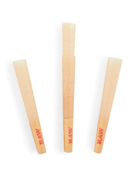 Close-up angled view of the RAW Classic Dogwalker Cone's 24mm unrefined paper filter tip in light brown. The built-in W-fold filter prevents loose herbs from pulling through into the mouth while maintaining optimal airflow during quick sessions.