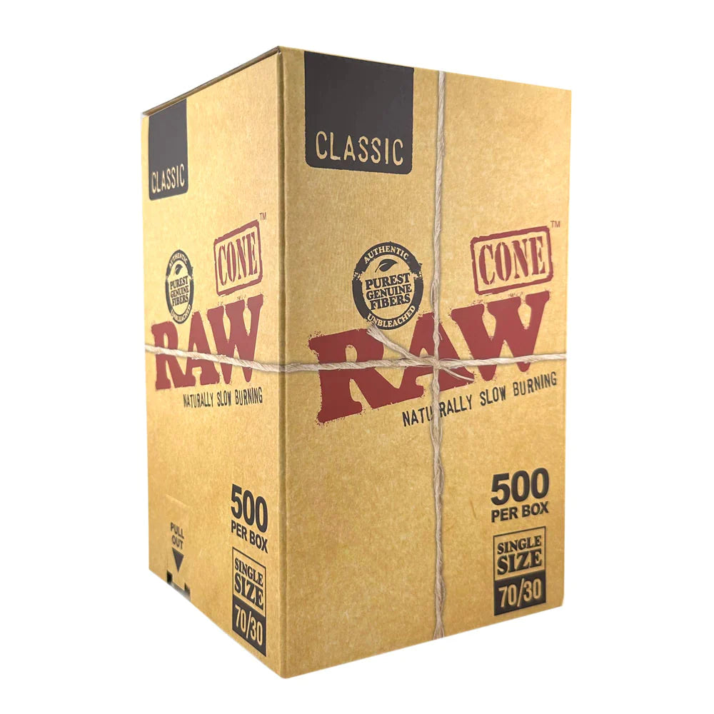 Front angled view of the RAW Classic Dogwalker 70/30 Bulk Cones 500-count box in natural kraft brown packaging. Measuring 70mm in length with a 30mm tip, these unbleached, mini-sized cones are perfectly proportioned for quick, individual smoke sessions.