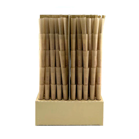 Angled overhead view of the RAW Classic Dogwalker 70/30 Bulk Cones box in natural brown. Showcasing the bulk packaging opened to reveal the neatly stacked layers, this 500-count box provides dispensaries or frequent smokers with an ample supply of ready-to-fill mini cones.
