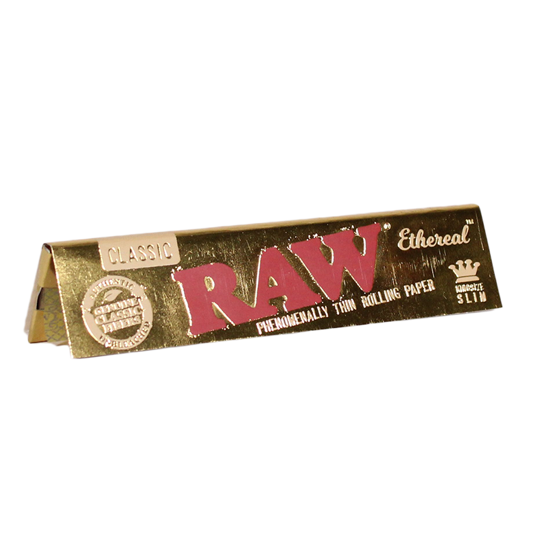 Front view of a single RAW Classic Ethereal Slim King Size rolling paper booklet in gold. This ultra-thin, low-density paper utilizes a signature crisscross watermark to ensure a slow and even combustion rate for advanced rollers.