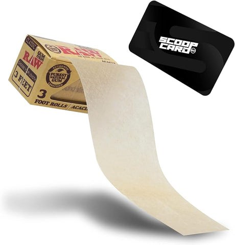 Front angled view of the RAW Classic Gum Strips 3-Feet 24-count box in natural kraft brown packaging with red branding. This retail-ready display carton provides smoke shops with an attractive countertop presentation for these specialty natural acacia adhesive rolls used for repairing or crafting custom pre-rolls.