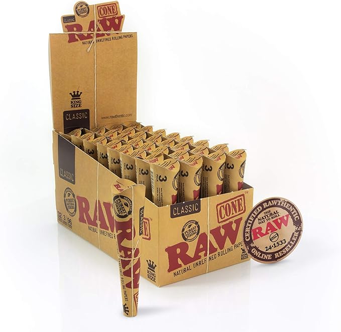 Angled front view of the light brown RAW Classic King Size Cones open retail display box. This 32-pack display holds individually packaged 3-count unrefined paper cones for quick and effortless retail counter sales.
