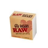 Rear profile view of the RAW Glass Heart Cone Holder showcasing the official stamped red brand script logo. The wide, flat heart geometry allows the glass tip to sit comfortably between your fingers during heavy smoking sessions.