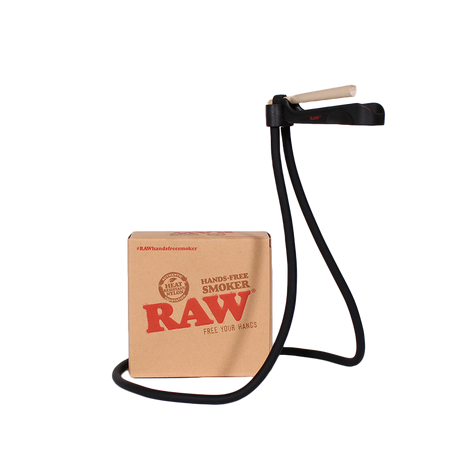 Front angled view of the RAW Hands-Free Smoker Wearable Ash Catcher in black and silver. This innovative neck-worn accessory holds your pre-roll at mouth level while a built-in tray catches the ash, allowing you to smoke completely hands-free while gaming or working.