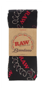 Top down flat lay view of the RAW Hemp Paisley Bandana in classic black with a distressed white paisley print pattern. This premium lifestyle apparel piece features custom branded graphics woven into the design, serving as a stylish headwrap or smoke shop wall hanging.