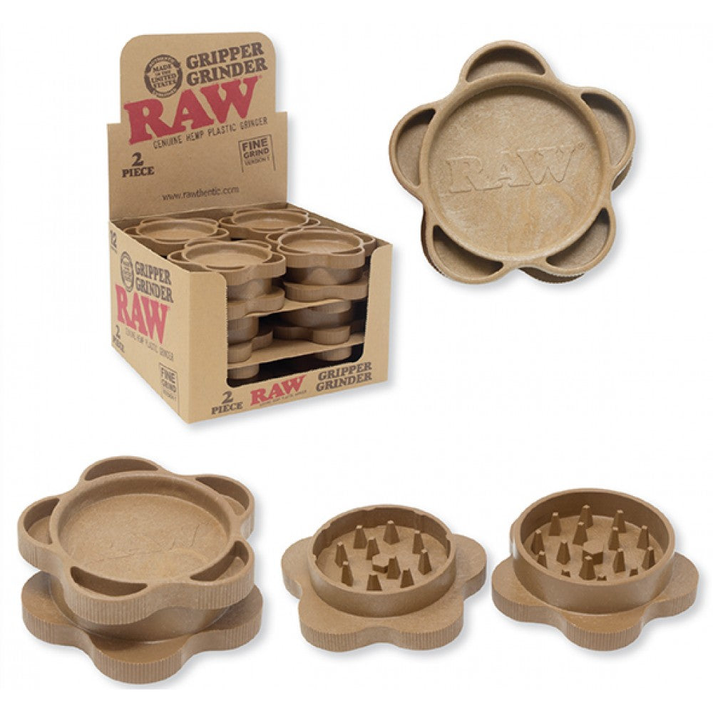 Front angled view of the RAW Hemp Plastic 2-Piece Gripper Grinder 12-count display box in natural kraft brown packaging. Made from an eco-friendly hemp composite, this retail-ready box provides smoke shops with an attractive, eco-conscious countertop presentation.