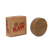Front angled view of the RAW Magnetic Stash Jar in brown with a RAW logo on the lid. Featuring a strong magnetic base, this discreet, pocket-sized container easily attaches to metal rolling trays to prevent accidental spills of your botanical extracts.