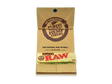 Front flat lay view of a single RAW Organic Hemp Artesano 1 1/4 booklet in natural tan. This comprehensive pack houses 50 unbleached organically grown hemp papers, a built-in pack of unrefined tips, and a magnetic closure to keep your rolling supplies securely locked together.