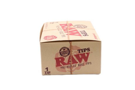 Side view of the RAW pre-rolled rose tips display box in natural kraft brown with red branding. This convenient retail-ready packaging provides an eye-catching point of purchase solution for premium unbleached filters.