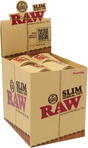 Front angled view of the RAW Slim Herbal Tips 20-pack display box in natural kraft brown packaging with green and red branding. This retail-ready counter display provides smoke shops with an attractive presentation for eco-friendly, pre-rolled filter tips.