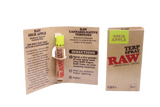 Angled overhead view of the open RAW Terpene Spray Sour Apple carton revealing the individual pocket-sized spray bottles. This fluid perfectly complements the user's chosen botanical material without introducing synthetic syrups.