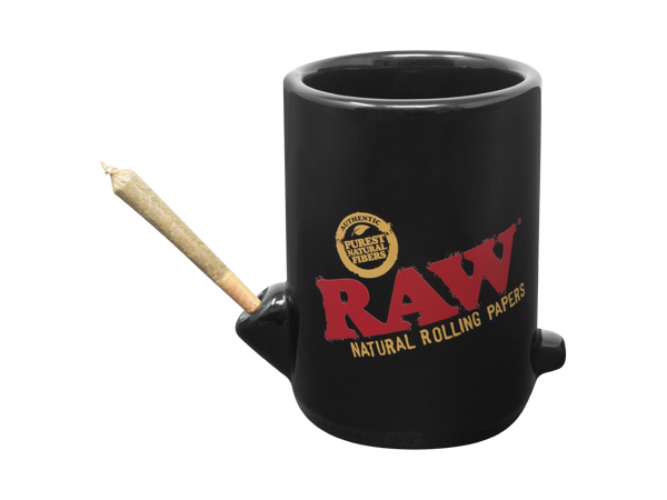 Front view of the RAW Wake Up Bake Up mug in matte black. This 2-in-1 ceramic coffee cup features a built-in dry herb bowl and mouthpiece, allowing users to sip their brew and smoke simultaneously for a relaxing morning routine.