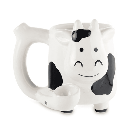 Front view of the Roast and Toast novelty mug pipe in the shape of a cow. This 2-in-1 functional ceramic coffee mug features a built-in dry herb pipe for the ultimate wake and bake session.