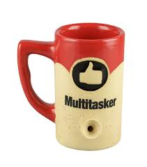 Front view of the Roast and Toast novelty mug pipe in red and white. This 2-in-1 functional ceramic coffee mug features a built-in dry herb pipe for the ultimate wake and bake session.