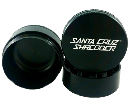 Front view of the Santa Cruz Shredder 3-piece medium aluminum grinder in matte black. This medical-grade aerospace aluminum grinder features a textured knurled grip and a strong magnetic lid for effortless, everyday shredding of your favorite dry herbs.