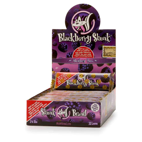 Front view of the Skunk Brand flavored rolling papers 1 1/4 size 24-count display box in a vibrant multicolored aesthetic with the iconic skunk logo. This wholesale countertop display case contains a sweet variety of slow-burning hemp papers designed to take the bite out of harsh herbs.