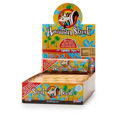 Front view of the Skunk Brand flavored rolling papers 1 1/4 size 24-count display box in a vibrant multicolored aesthetic with the iconic skunk logo. This wholesale countertop display case contains a sweet variety of slow-burning hemp papers designed to take the bite out of harsh herbs.