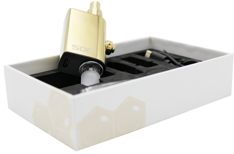 Close-up top down view of the SOC Tokes dual use vaporizer highlighting the magnetic mouthpiece and deep concentrate tank. The threadless magnetic connection allows users to quickly and effortlessly load their thick wax extracts without any sticky mess.
