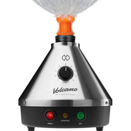 Front standing view of the Storz & Bickel Volcano Classic with a clear Easy Valve balloon attached. The iconic detachable balloon system captures pure vapor for smooth and convenient consumption anywhere in the room.