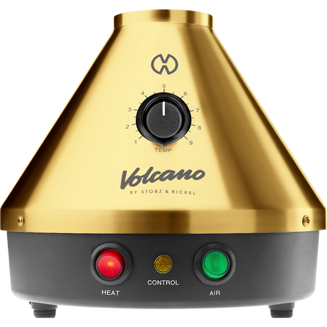 Front view of the Storz & Bickel Volcano Classic in striking 24-karat gold. This legendary desktop vaporizer features a robust electromechanical design and convection heating for pure dry herb vaporization.