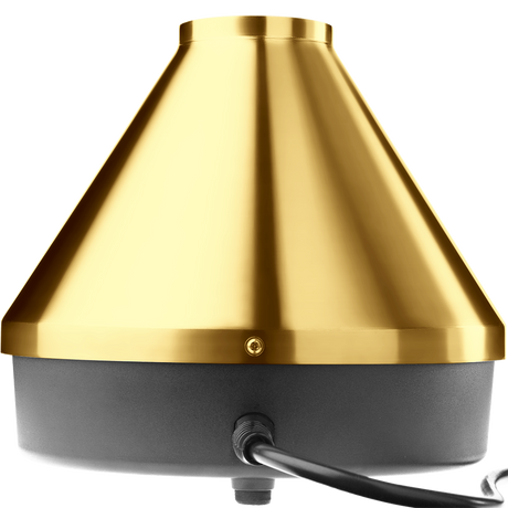 rear angled view of the Storz & Bickel Volcano Classic in striking 24-karat gold. This legendary desktop vaporizer features a robust electromechanical design and convection heating for pure dry herb vaporization.