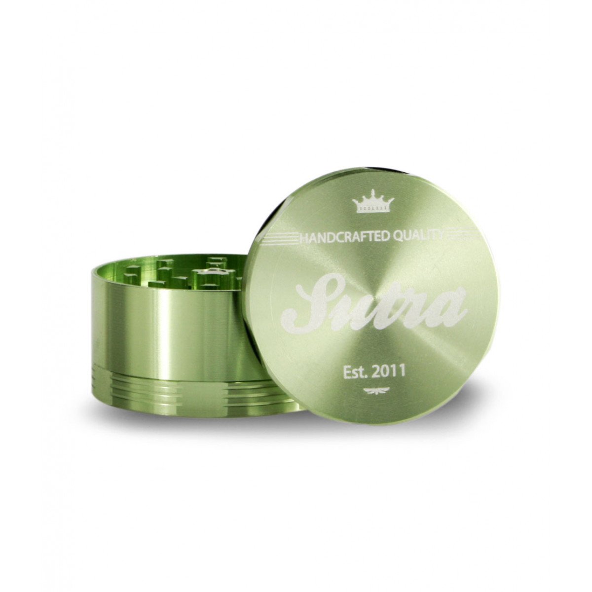 Angled front view of the Sutra Aluminum 4-piece 65mm herb grinder in a metallic green finish. Built with razor-sharp diamond-cut teeth, this premium 4-layer sifter cleanly slices through material without clogging or tearing.