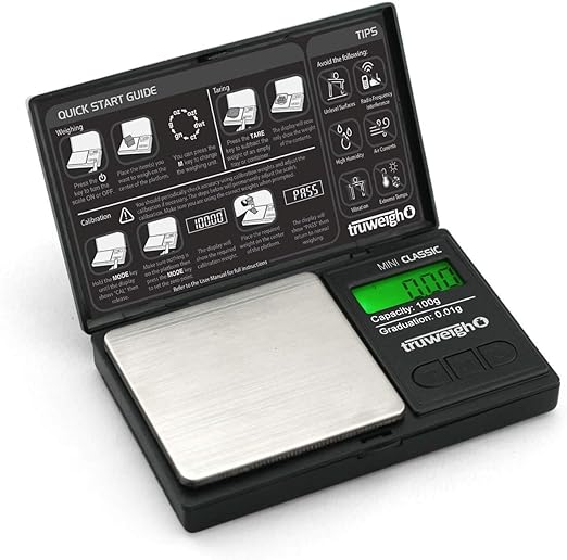 Front angled view of the Truweigh Mini Classic digital scale in sleek black. This ultra-compact pocket scale features a 100g maximum capacity and an ultra-precise 0.01g readability for accurately measuring fine botanical herbs and solid concentrates.