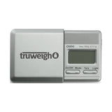Front angled view of the Truweigh OMNI digital pocket scale in sleek black. This ultra-compact pocket scale features a 500g maximum capacity and precise 0.1g readability for accurately weighing loose botanical herbs and solid concentrates.