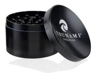 Front view of the Tsunami 100mm sunken top herb grinder in sleek black. This extra-large, premium aluminum grinder features a unique bowl-shaped top perfect for conveniently mixing and rolling your dry herbs.