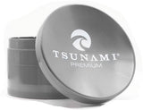 Front view of the Tsunami 100mm sunken top herb grinder in sleek silver. This extra-large, premium aluminum grinder features a unique bowl-shaped top perfect for conveniently mixing and rolling your dry herbs.