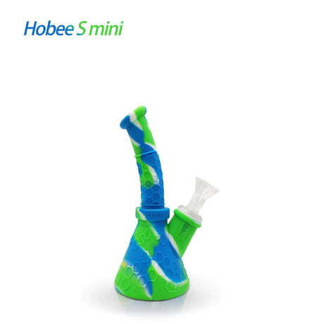Front profile view of the Waxmaid 8.5 Inch Hobee's Silicone Beaker Water Pipe in a marbled blend of blue, white, and green. This platinum-cured silicone water pipe features a traditional beaker design that is completely unbreakable for reliable travel use.