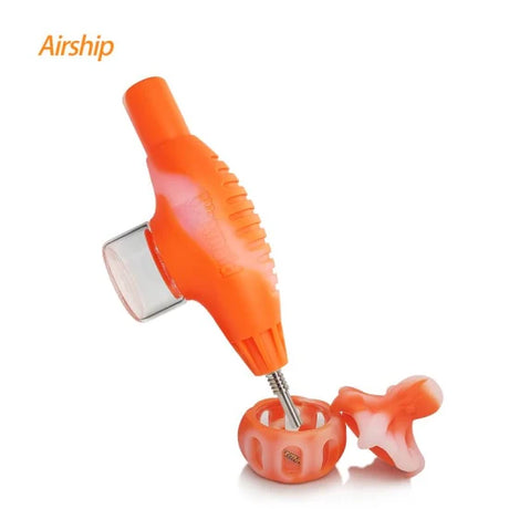 Front angled view of the Waxmaid Airship Silicone Nectar Collector Kit in a vibrant multicolored orange and white swirl. This futuristic space-themed dab straw kit includes a durable silicone body and a medical-grade titanium nail tip for smoothly vaporizing solid wax and essential oils.