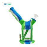 Front angled view of the Waxmaid Gemini 2-in-1 Silicone Pipe in a vibrant multicolored blue white and green swirl. This versatile hybrid smoking accessory functions as a durable, drop-proof hand pipe for enjoying dry herb.