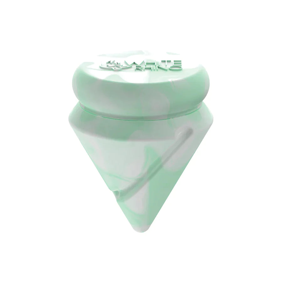 Angled top-down view of the White Rhino diamond spinner carb cap opened to reveal the internal silicone storage jar and the included clear glass terp ball. This 2-in-1 travel-friendly design keeps your sticky concentrates safely stored directly inside your carb cap.