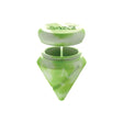 Angled top-down view of the White Rhino diamond spinner carb cap opened to reveal the internal silicone storage jar and the included clear glass terp ball. This 2-in-1 travel-friendly design keeps your sticky concentrates safely stored directly inside your carb cap.