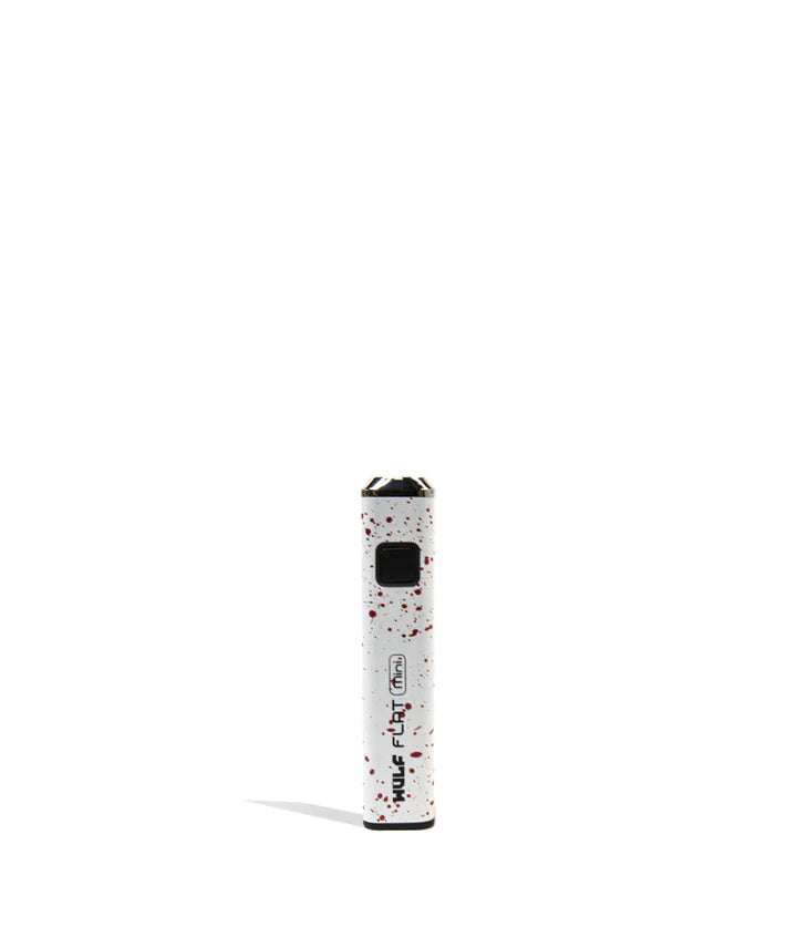 Front view of the Wulf Flat Mini cartridge vaporizer battery in white red splatter. The innovative flat-bottomed frame allows the compact vape battery to stand completely upright on desks for clean storage.