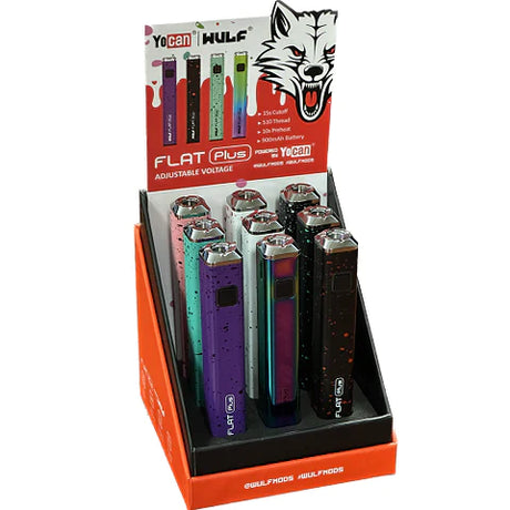 Front view of the Wulf Flat Plus cartridge vaporizer battery 9pk point-of-sale counter display box in black with graphic branding. This wholesale retail display holds nine assorted splatter and full-color 510 batteries for easy countertop selection.