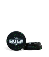 Front angled view of the Wulf Mods 2-Piece 50mm Spatter Aluminum Grinder in black with vibrant green paint splatter. This ultra-compact, travel-friendly magnetic herb grinder features a streamlined two-piece design to quickly and efficiently shred your botanical blends without any extra bulk.