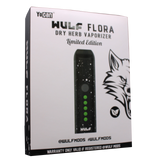 Front view of the Wulf Mods Flora vaporizer in black and white splatter. The device includes an intuitive OLED display and temperature control buttons for precise botanical heating.