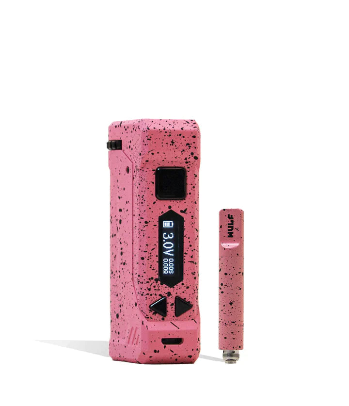 Front view of the Wulf Uni Pro Max cartridge vaporizer showcasing its signature colorful splatter finish on a pink chassis. This dynamic 510-threaded box mod features a crystal-clear LED screen and a 650mAh battery for highly customized sessions.