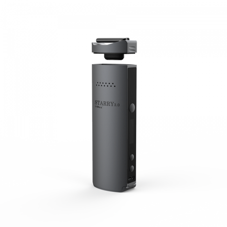 Close-up view of the silver metal mesh concentrate pad being placed into the XVAPE Starry 3.0 oven. This accessory allows the conduction heating chamber to seamlessly transition from vaping dry herbs to vaporizing wax extracts.