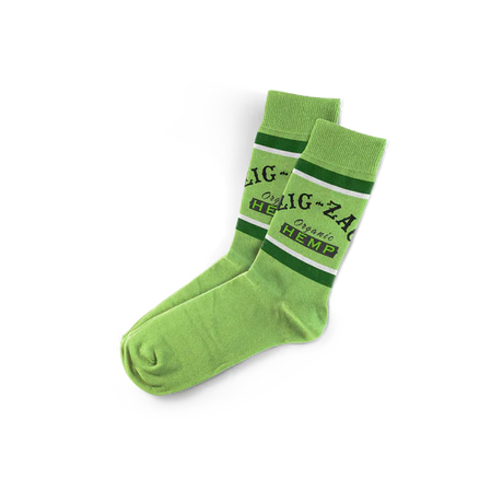 Front flat lay view of a pair of Zig-Zag Hemp Logo Socks in natural cream white with an orange and black knit logo. These premium unisex crew socks blend eco-friendly hemp fiber and soft cotton to provide exceptional breathability and everyday durability.
