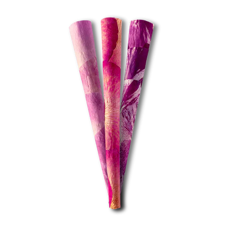 Top-down overhead view of several natural, deep pink Zig-Zag Rose Cones resting flat. Crafted from real, unbleached rose petals, these specialty cones deliver a smooth, slow-burning, and subtly floral smoking experience.